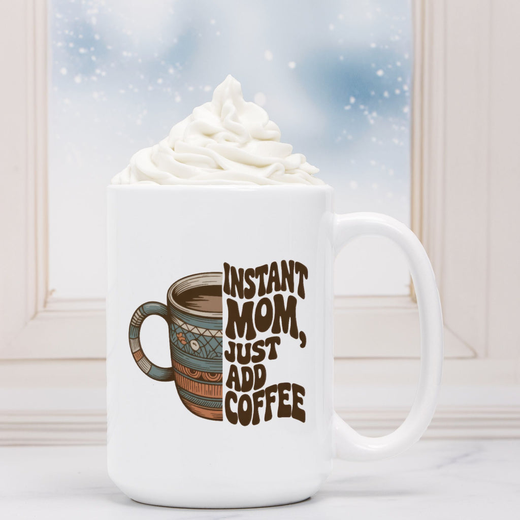 White mug with coffee design and text 'Instant Mom, Just Add Coffee' against a snowy window background.