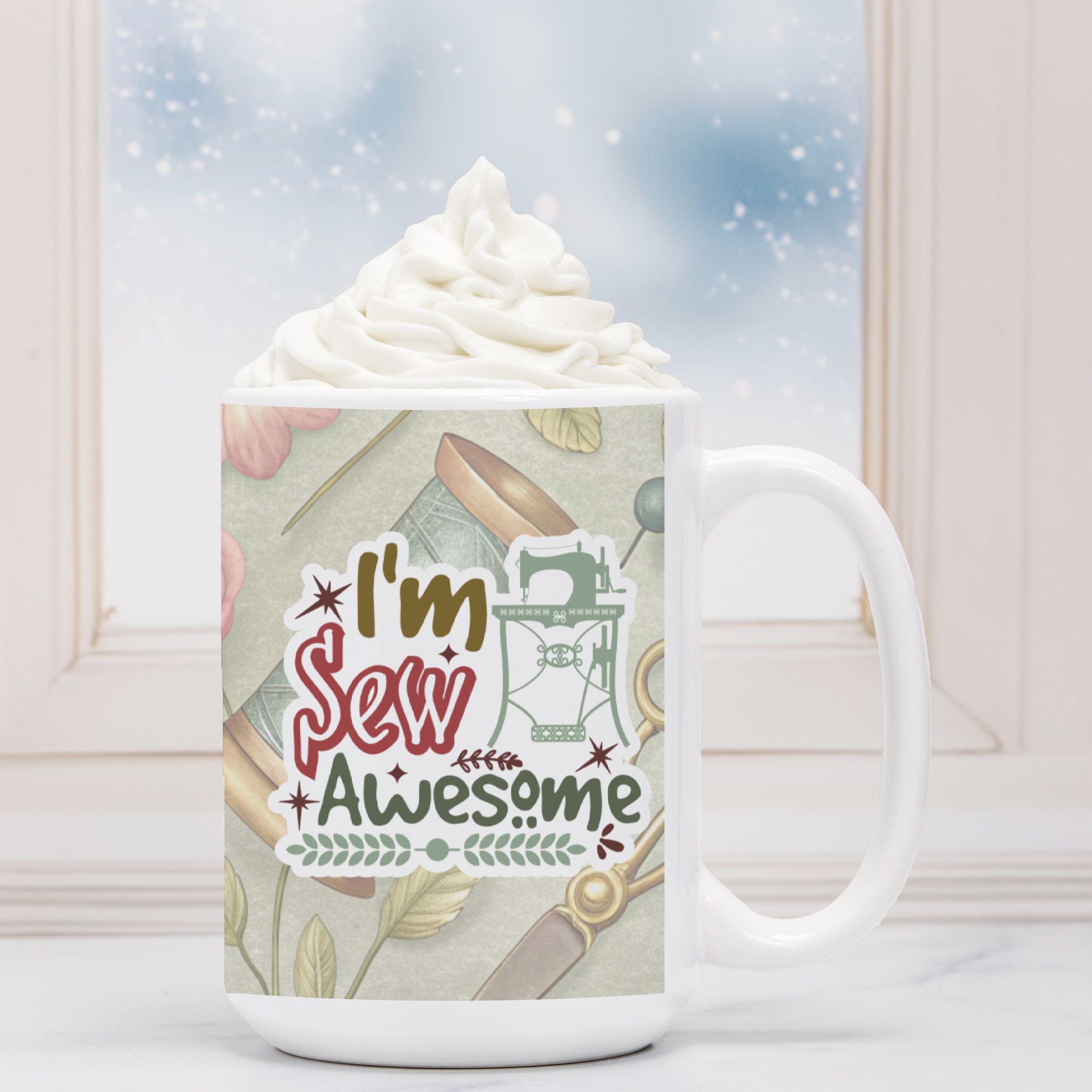 Mug with 'I'm Sew Awesome' design featuring sewing-themed graphics, filled with hot chocolate and whipped cream.