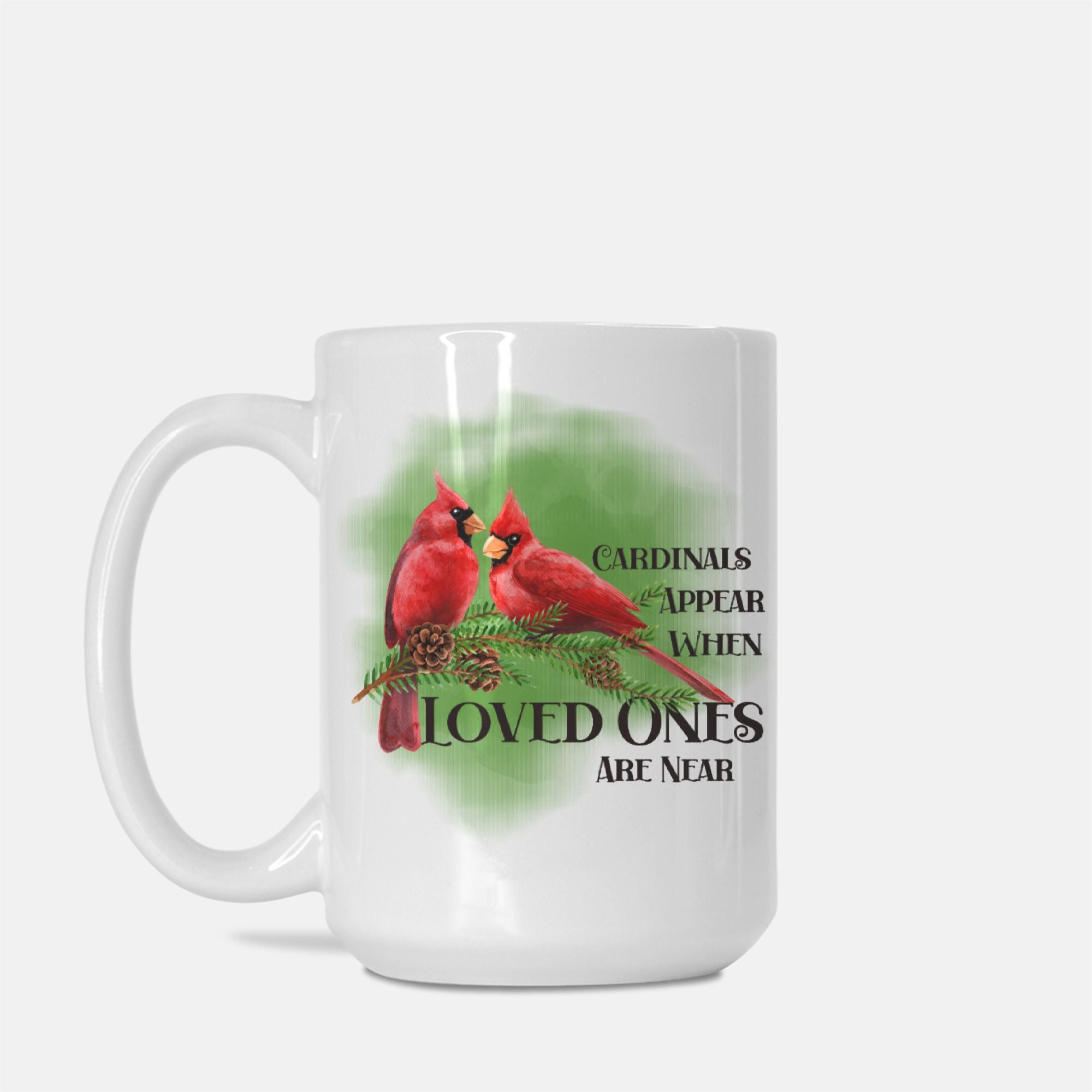 White mug with red cardinals and text on a white background