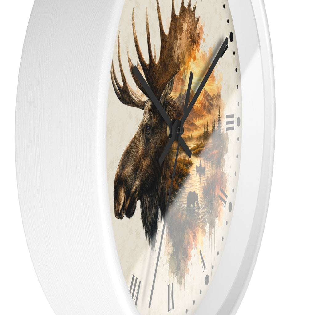 Round wall clock with a white frame and a printed moose head over a scenic landscape design on the face, shown against a plain white background.