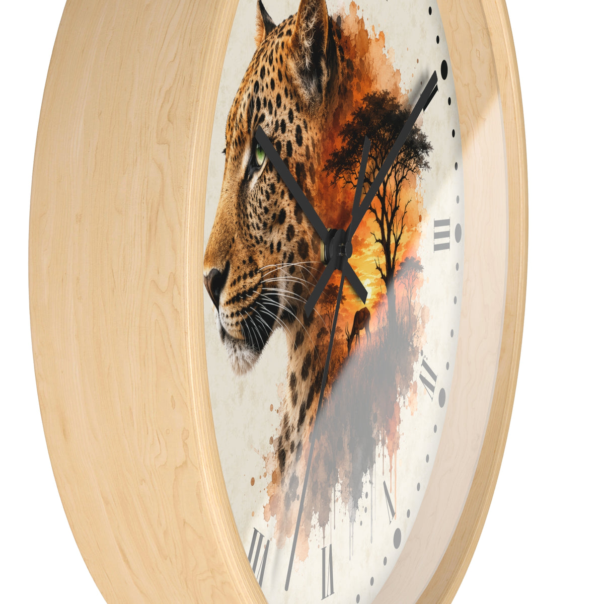 A round wall clock with a light natural wood frame and a printed face featuring a leopard portrait blending into an African savanna scene with trees and a sunset. The clock has black hands, black Roman numerals, and no visible brand text.