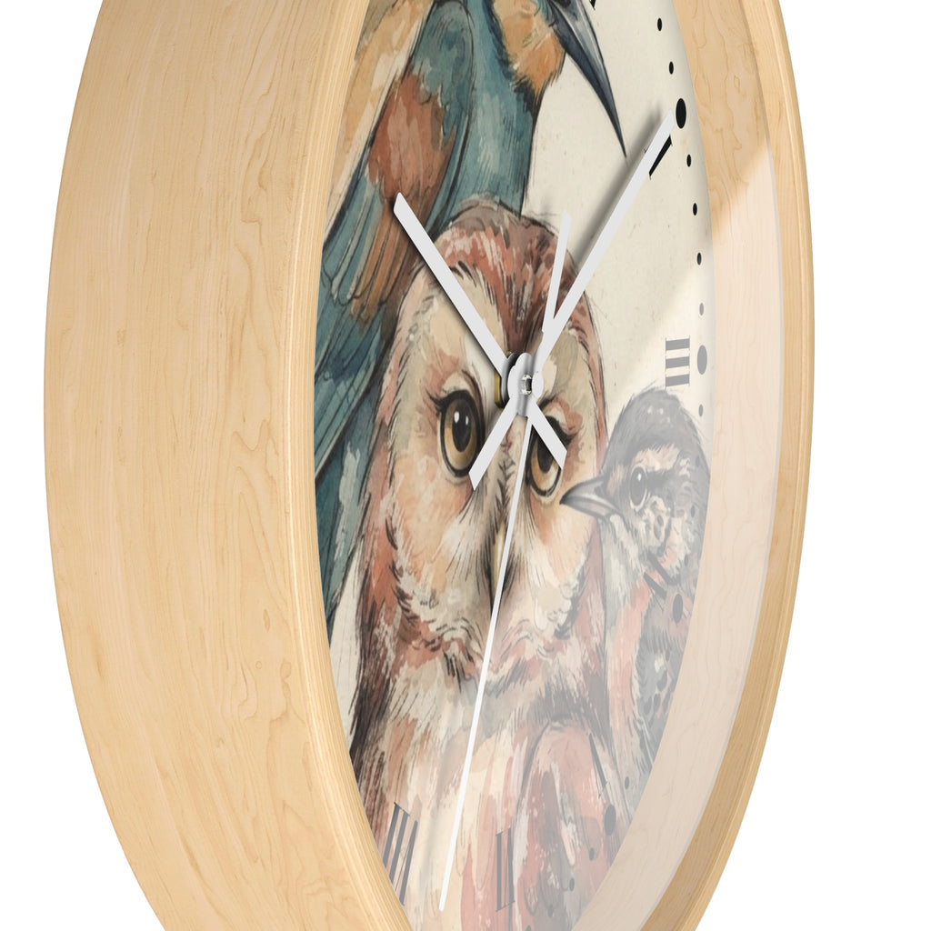 Round wall clock with a light natural wood frame and a bird illustration on the face, featuring a large owl in the center with other birds around it and white clock hands.