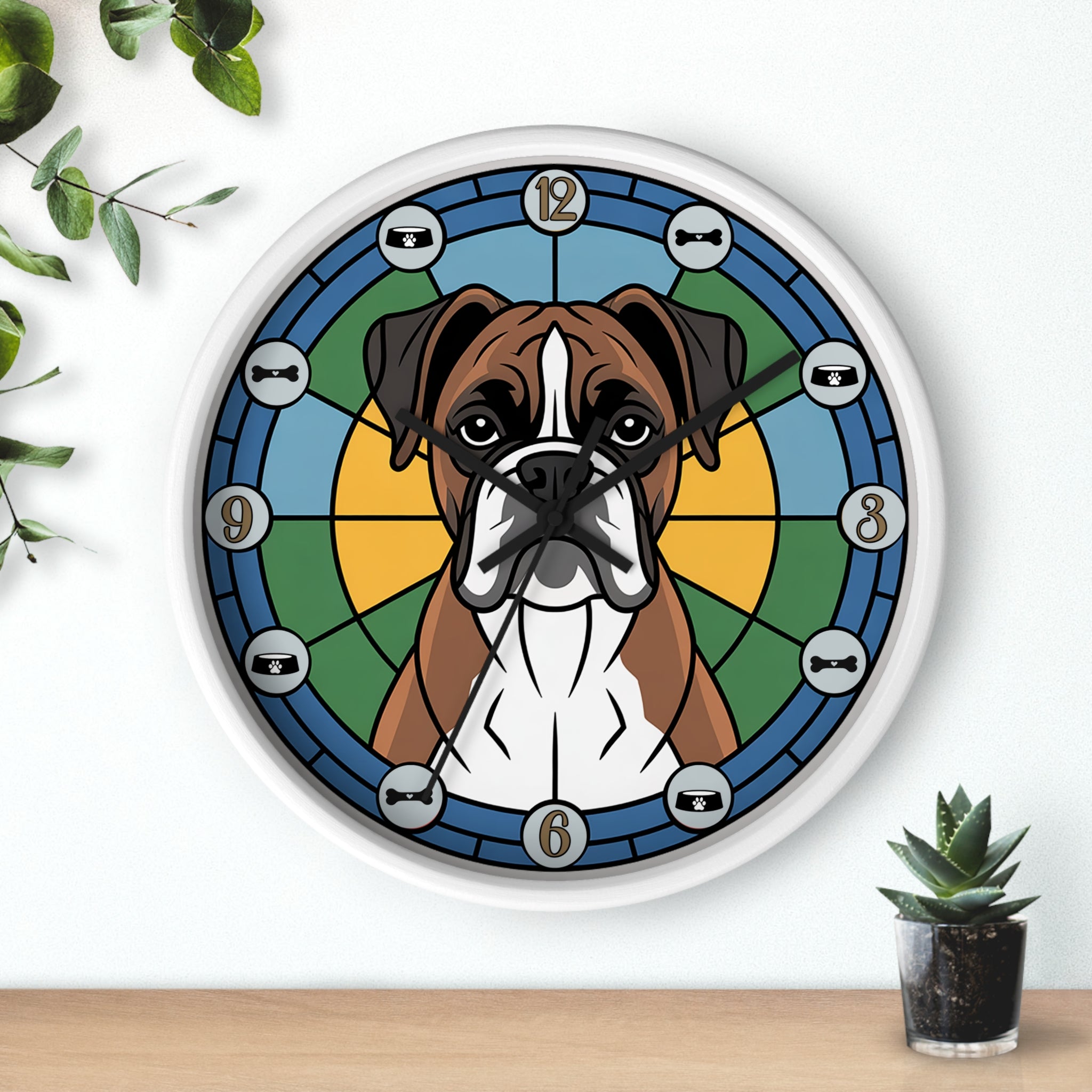 Wall clock with a dog design on a white wall with plants.