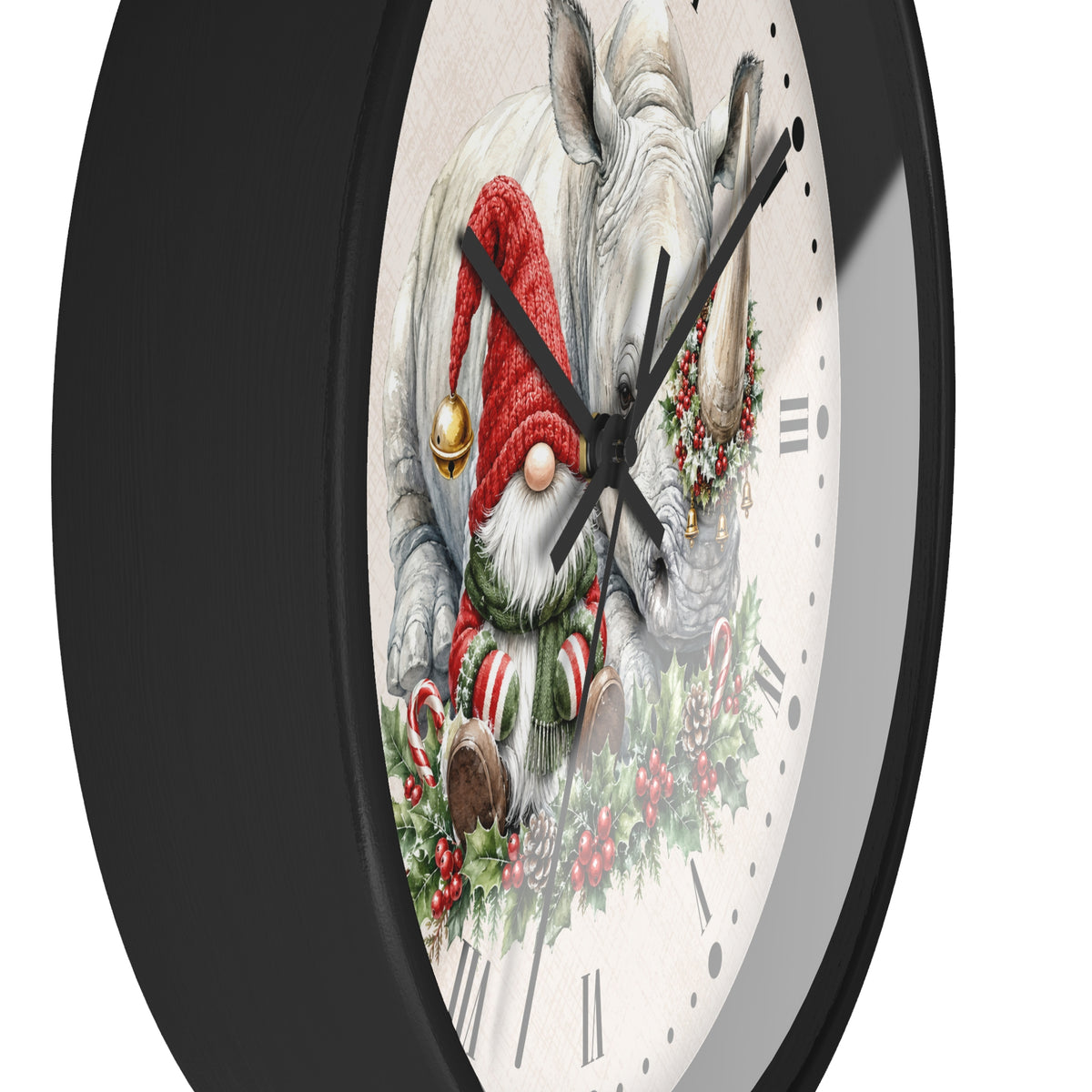 A close-up of a round wall clock with a black frame and a white dial featuring a festive illustration of a gnome in a red Santa hat and green scarf, surrounded by holiday greenery and candy canes.