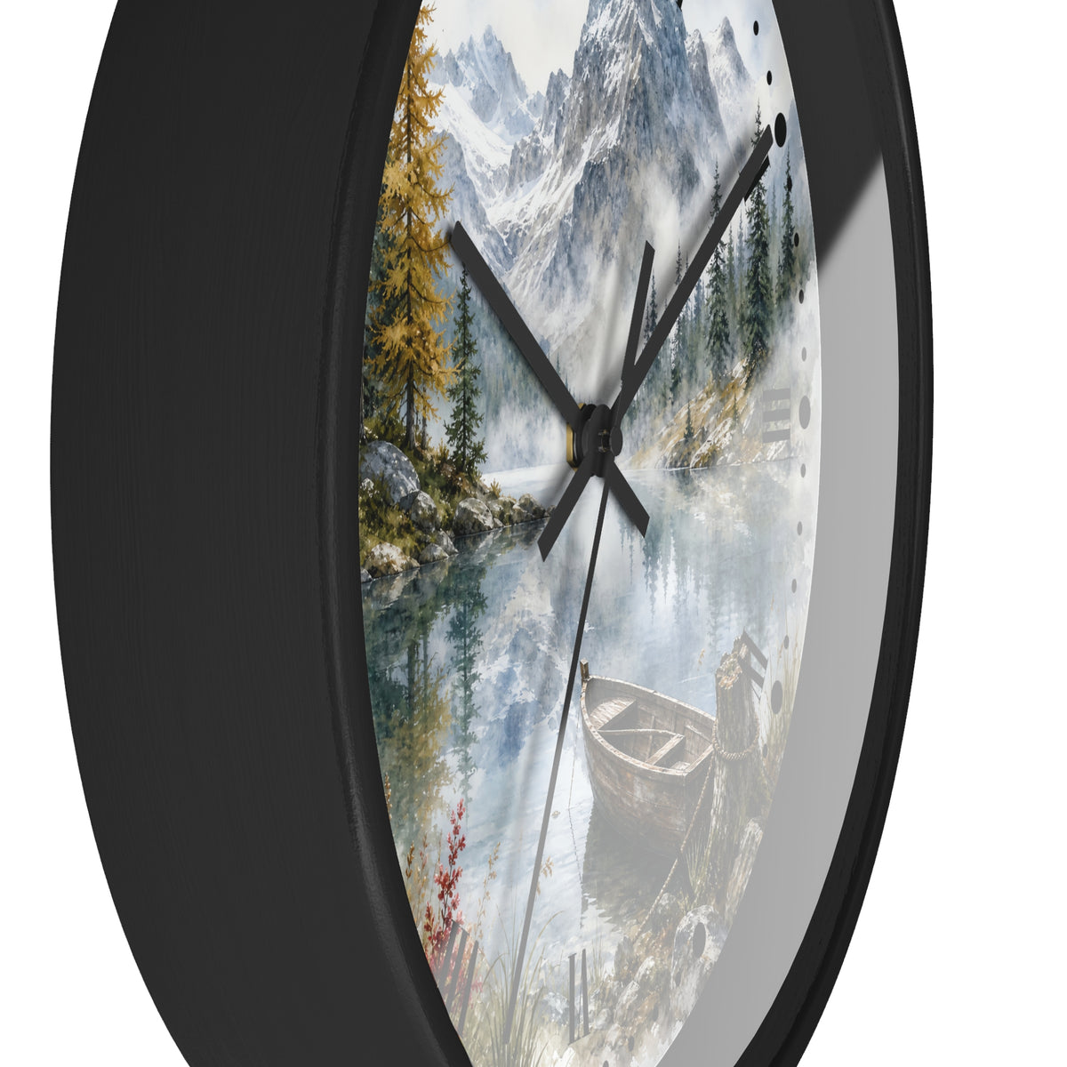 Round wall clock with a black frame and a scenic mountain lake print on the face, featuring pine trees, a boat, and white mountain peaks.