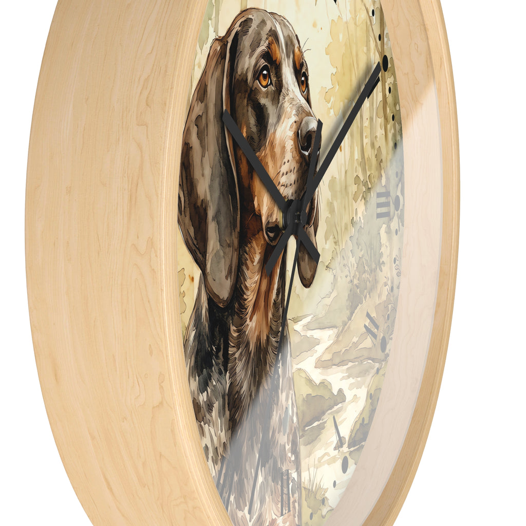Round wall clock with a light natural wood frame and a printed portrait of a hunting dog on the face, with black clock hands, shown against a plain white background.