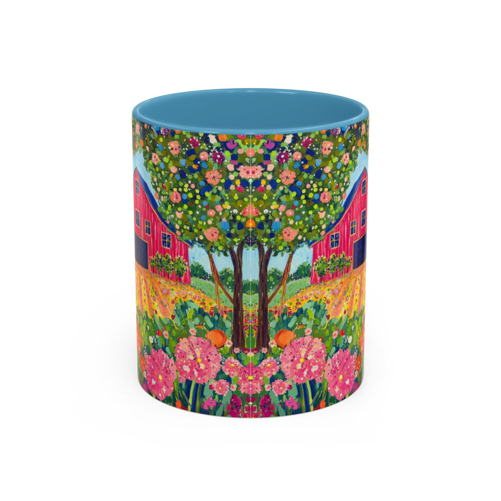 Colorful mug with a floral and cabin design on a white background