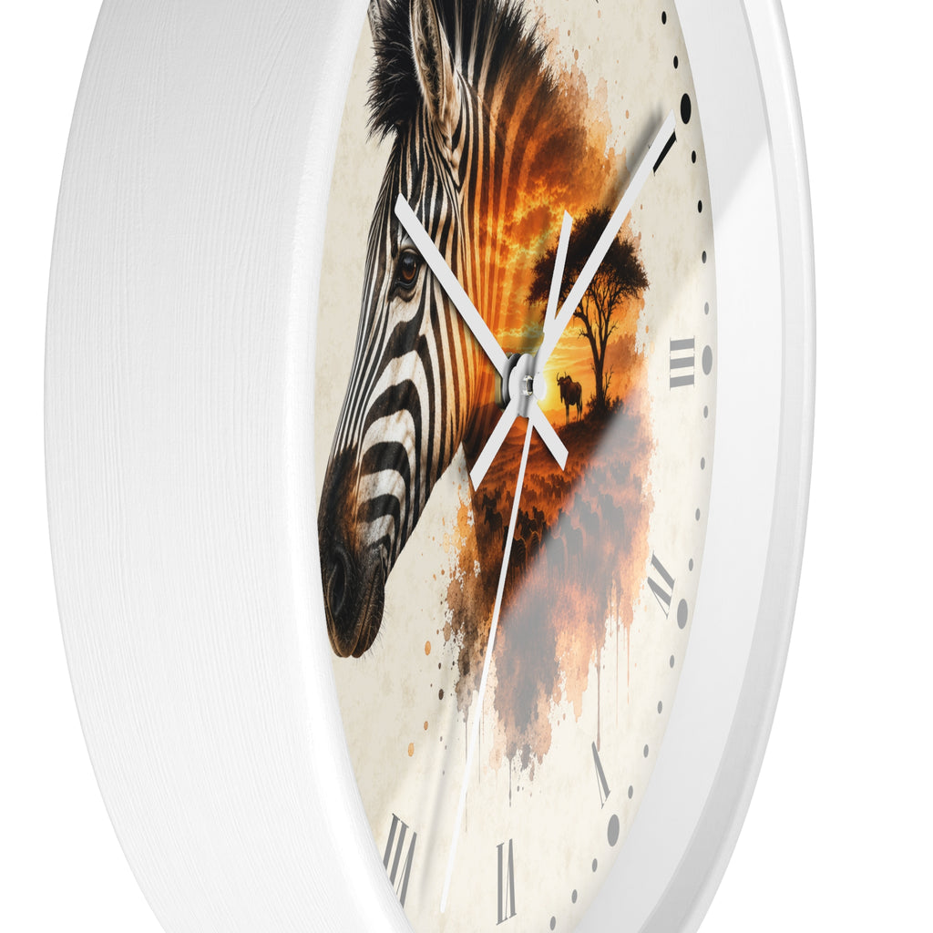 A white round wall clock with a printed face featuring a zebra head on the left and an orange-toned landscape with trees on the right, shown against a plain white background.