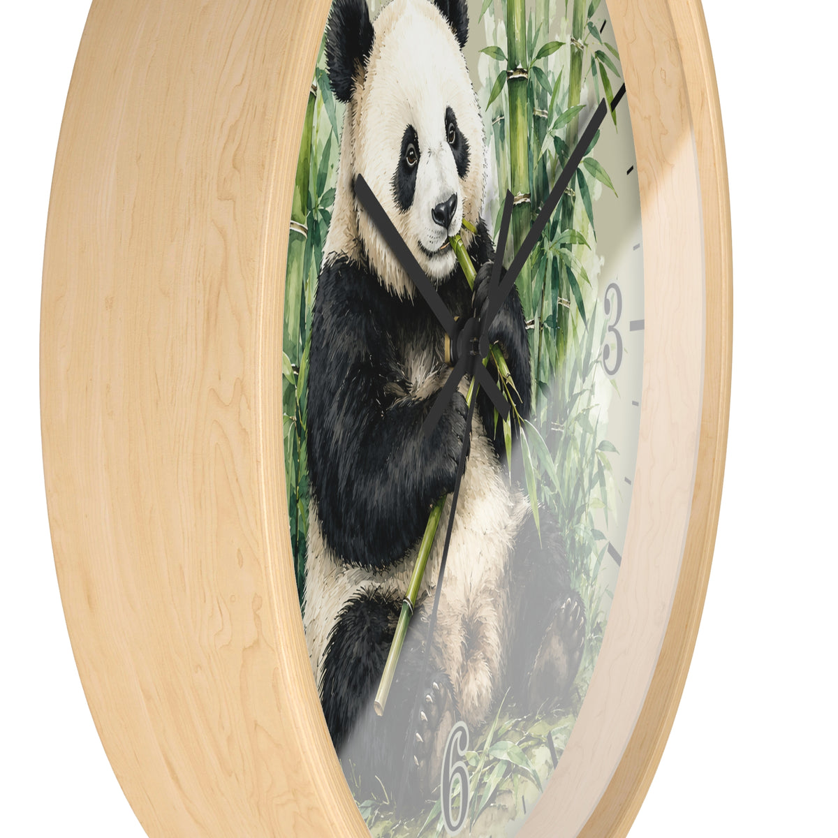 Round wall clock with a light natural wood frame and a printed panda-on-bamboo face, shown against a plain white background.