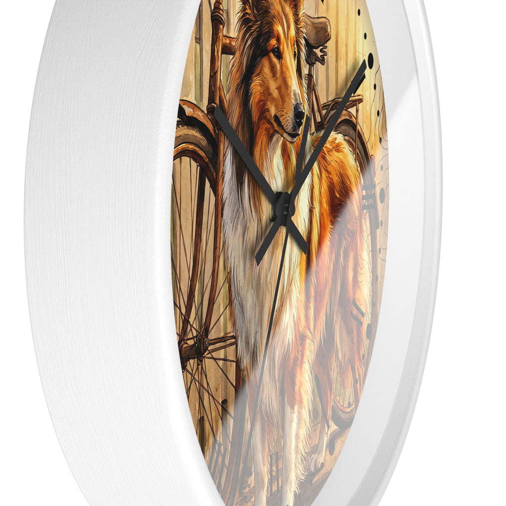A white oval wall clock featuring a printed illustration of a collie dog and a bicycle on the face, shown against a plain white background.