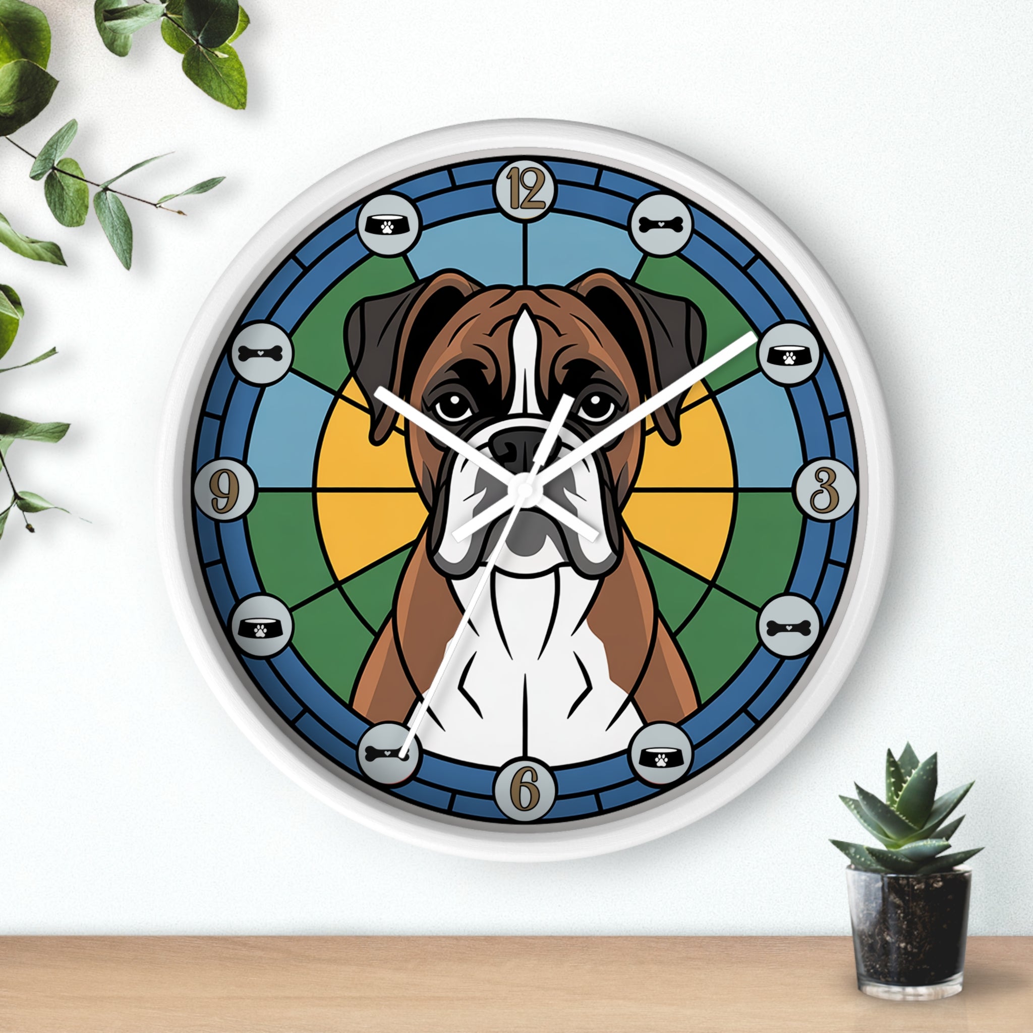 Wall clock with a dog design on a white wall with plants.