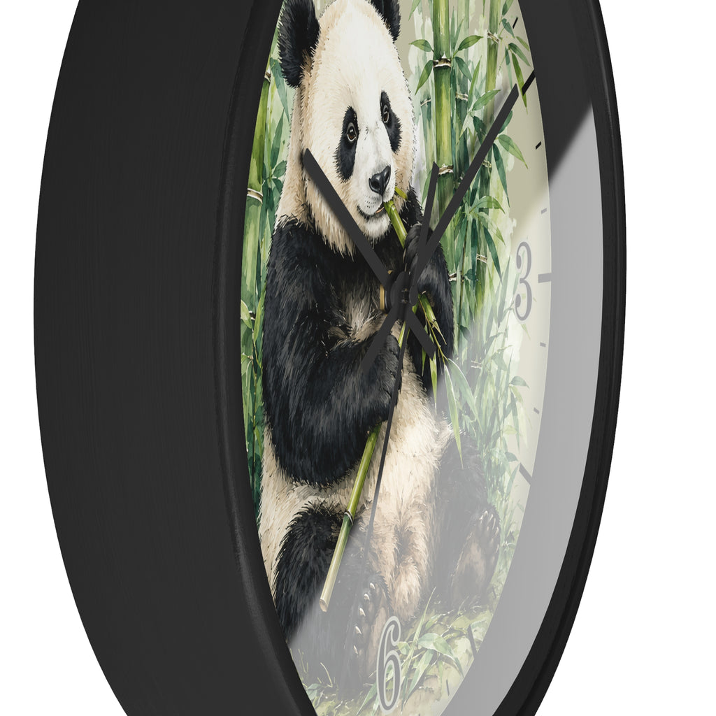 A round wall clock with a black frame and a printed panda illustration on the face, shown against a plain white background.