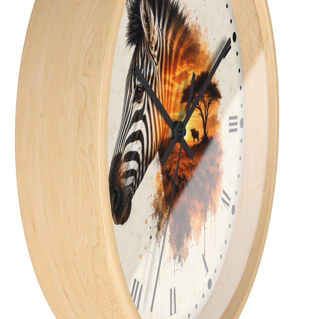 Round wall clock with a light natural wood frame and a printed dial featuring a zebra head blending into an orange sunset scene with a tree silhouette.