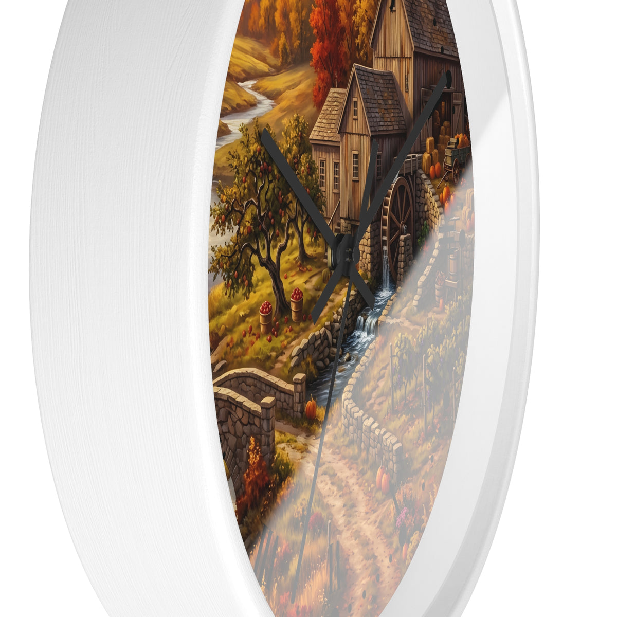 Round wall clock with a white frame and a scenic autumn landscape print featuring a water wheel mill, trees, and a winding stream.
