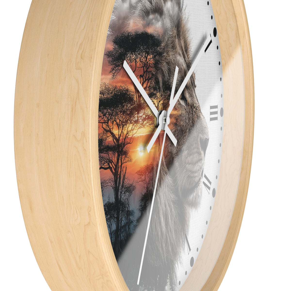 Round wall clock with a light natural wood frame and a split-face design showing a lion face on one side and an African savanna sunset with acacia trees on the other, featuring white hands and black Roman numerals.