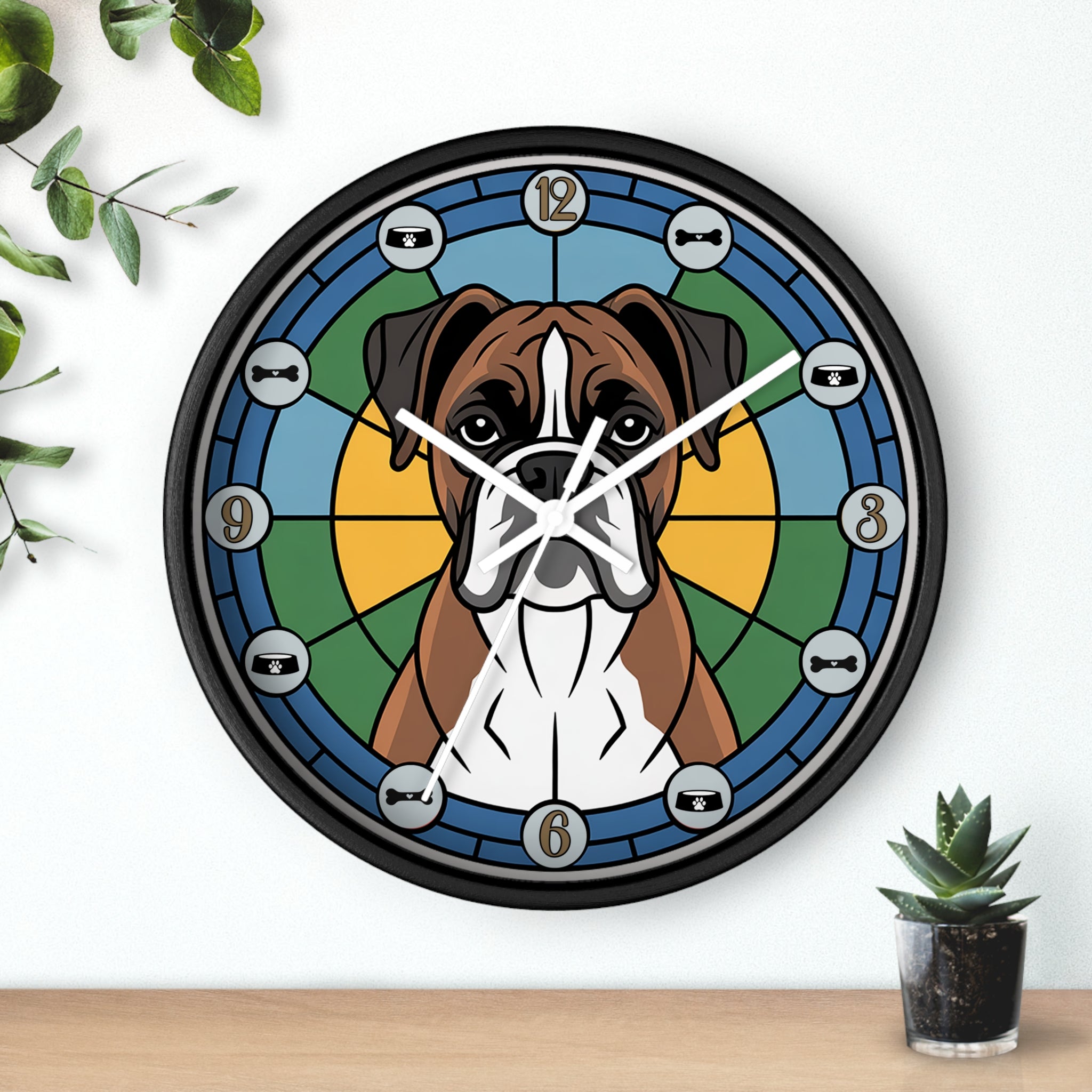 Wall clock with a dog design on a white wall with plants.