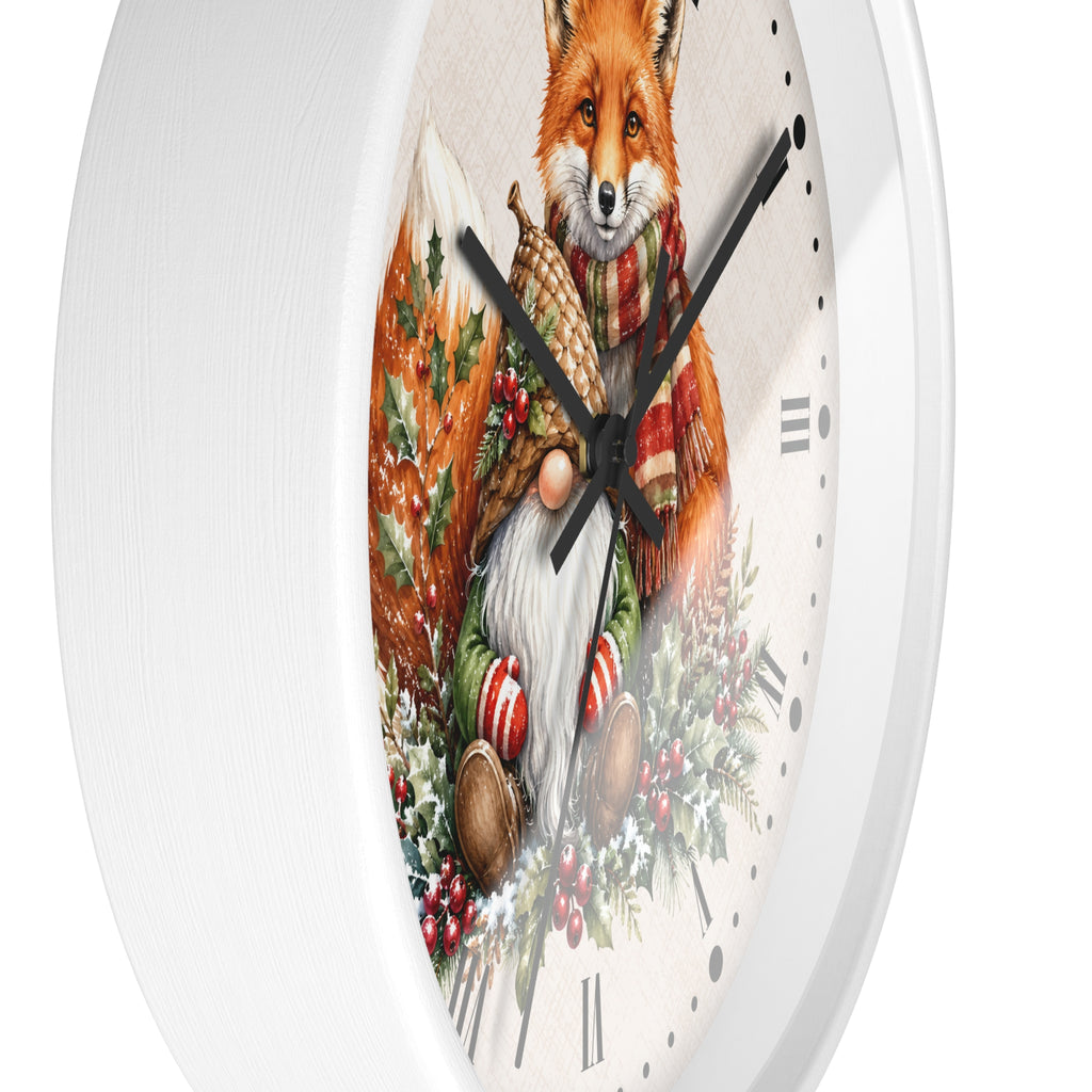 A round white wall clock featuring a detailed illustration of a red fox dressed in a festive red and green plaid scarf and winter clothing, surrounded by holly, pinecones, and candy canes on the clock face.