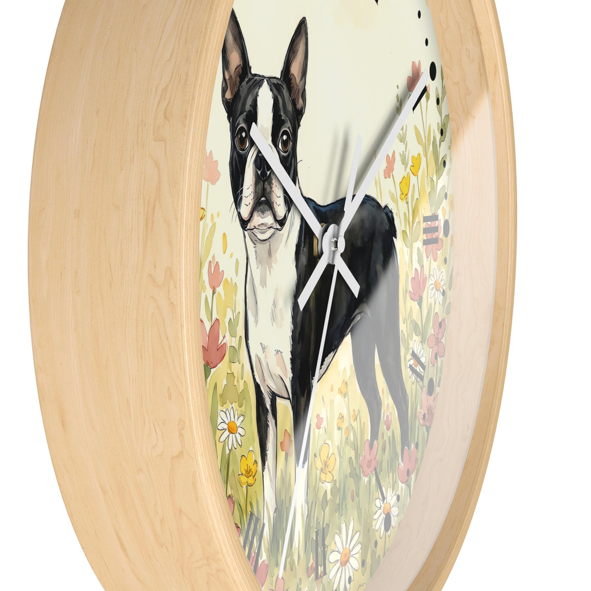 Round wall clock with a light natural wood frame and a printed face showing a black-and-white Boston Terrier standing in a flower field. The clock is photographed against a plain white background.