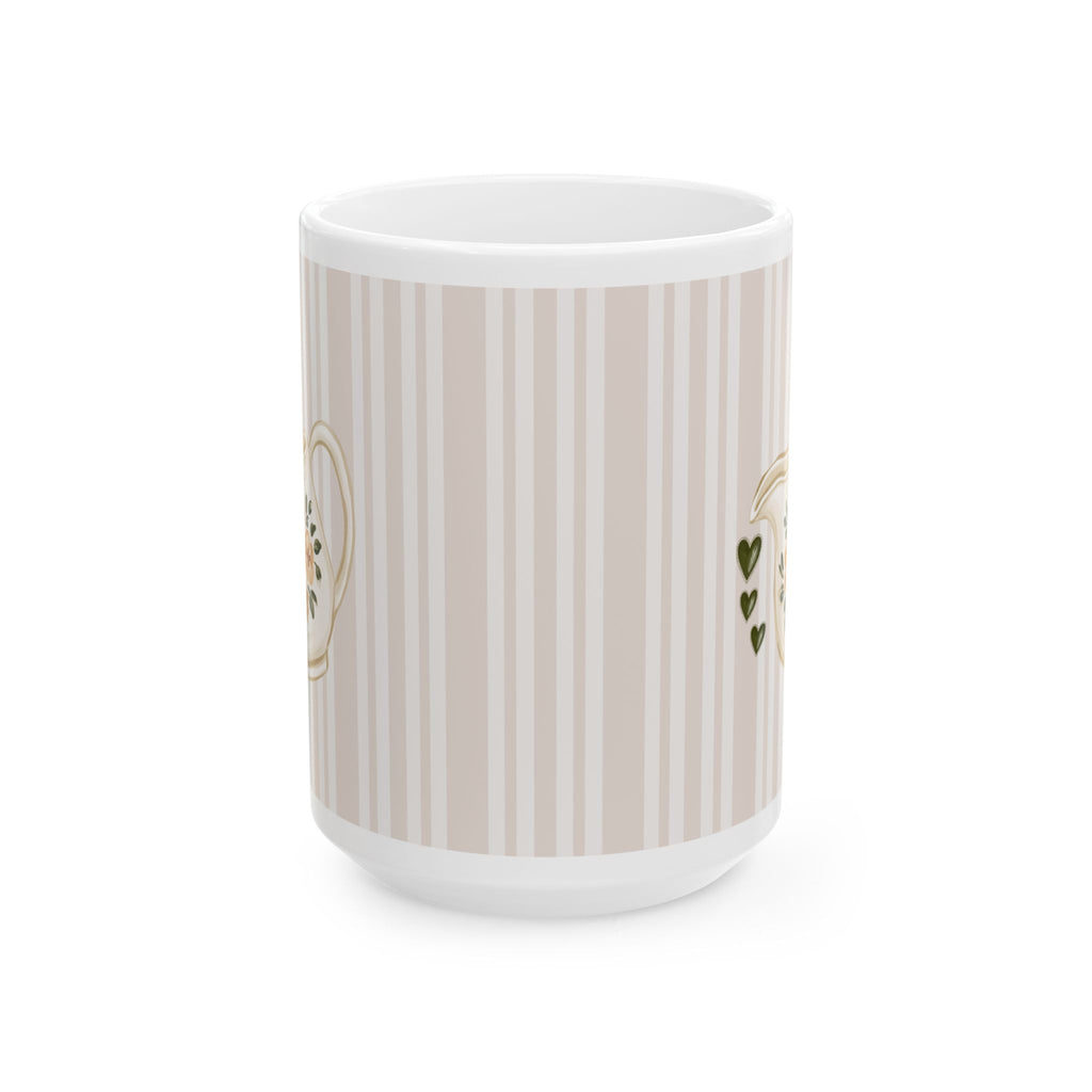 A white ceramic mug featuring a beige and white vertical stripe pattern on its body, with small gold and green decorative details visible on the sides, set against a plain white background.