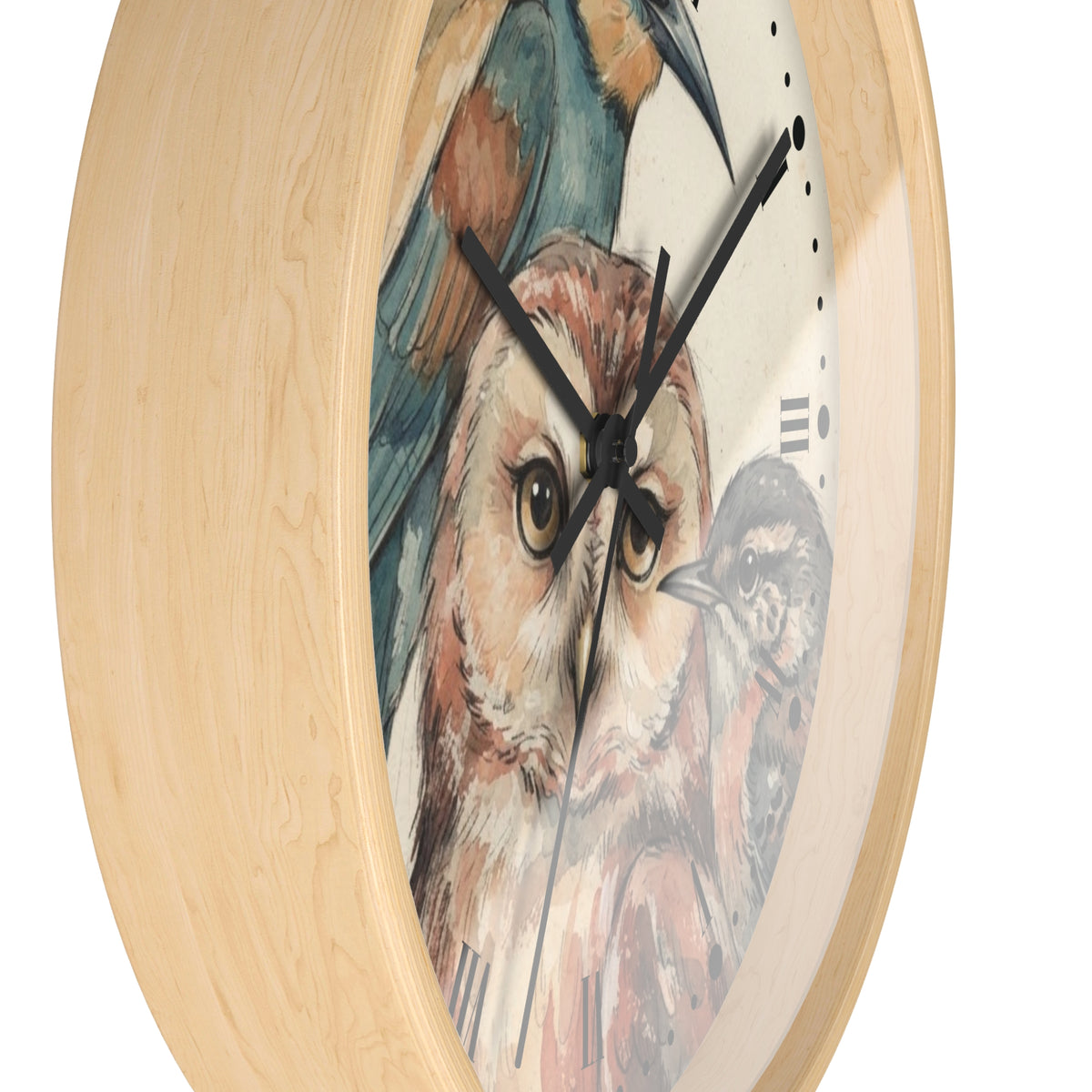 A round wall clock with a light natural wood frame and a printed bird illustration on the face, featuring a large owl in the center and black clock hands against a white background.