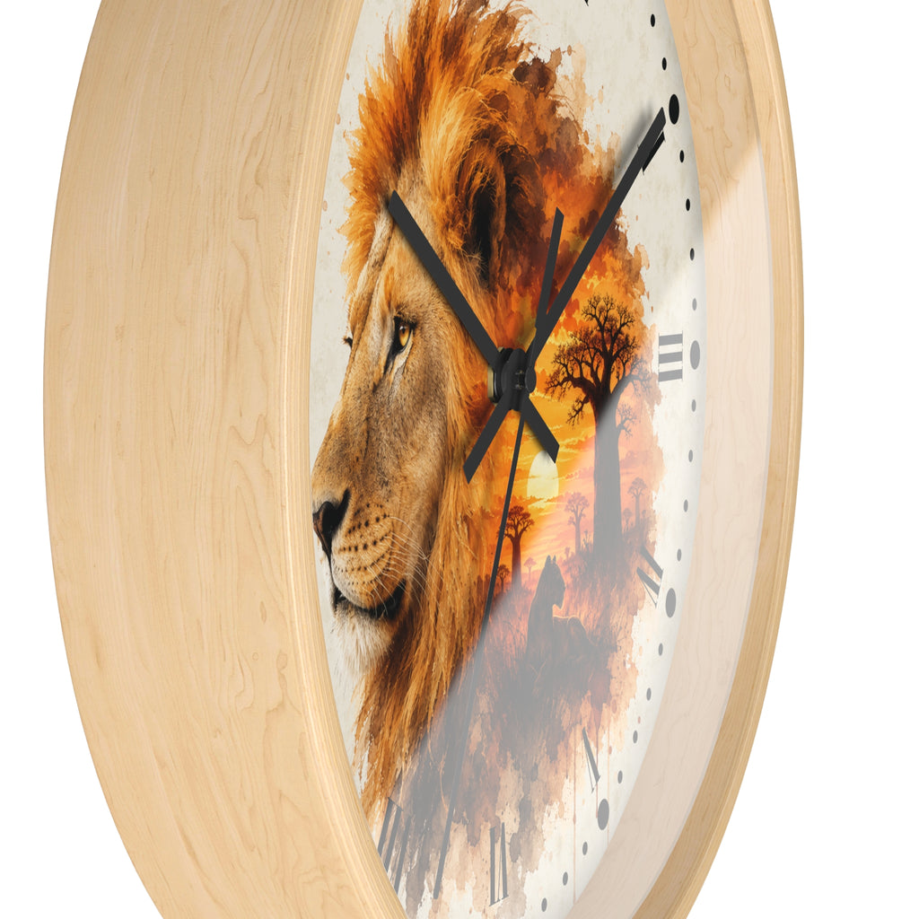 Round wall clock with a light natural wood frame and a printed lion face over an African savanna sunset scene on the dial, shown against a plain white background.