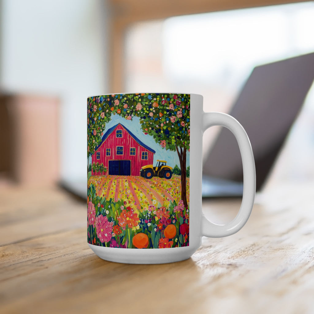 Mug with a colorful design of a red barn, flowers, and a tractor on a wooden surface.