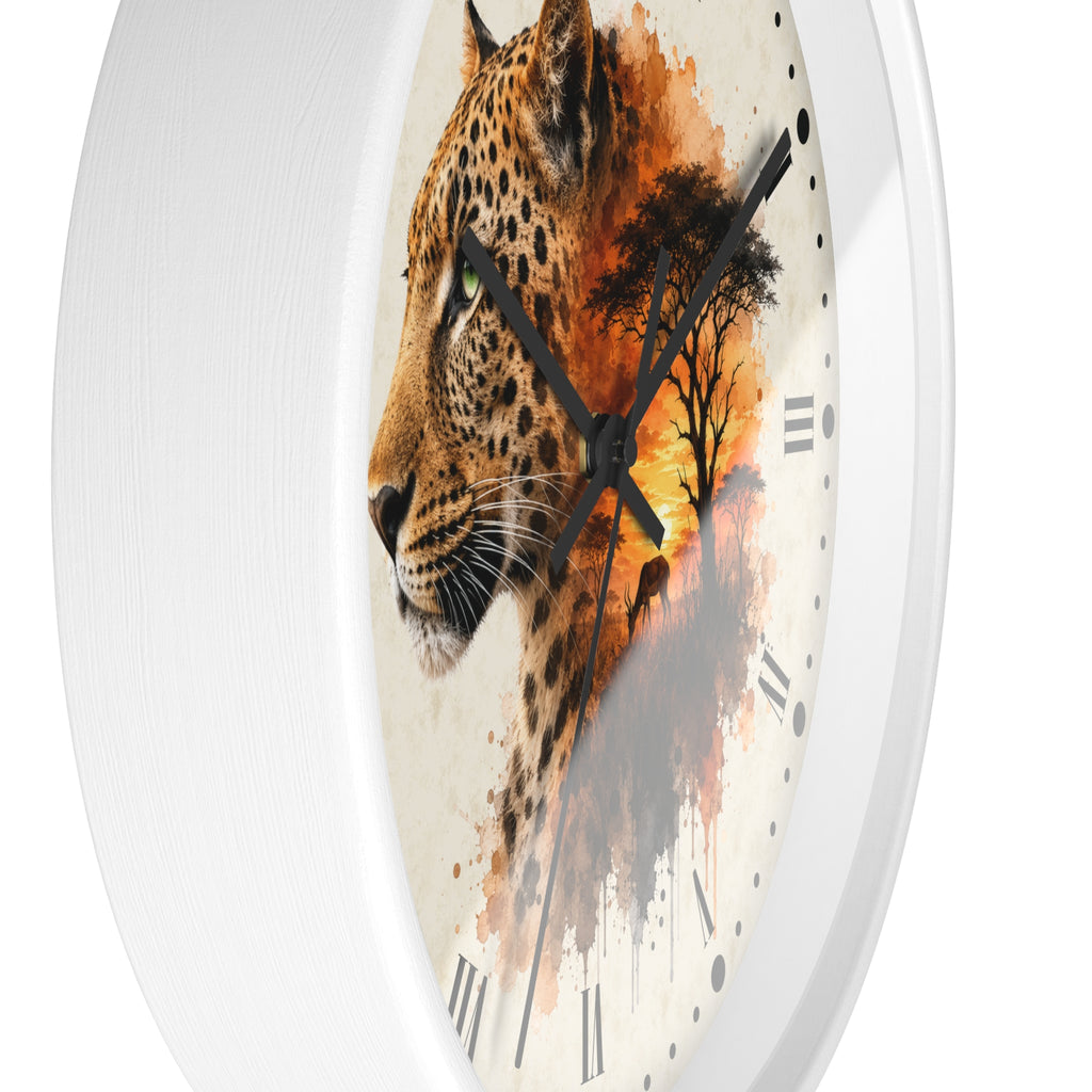 Round wall clock with a white frame and a printed design of a leopard head merging into an orange and brown sunset landscape on the clock face.
