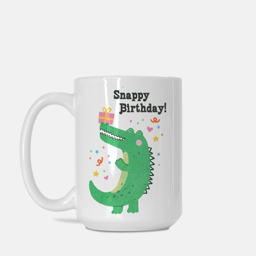 White mug with a green alligator design and 'Snappy Birthday!' text on a white background