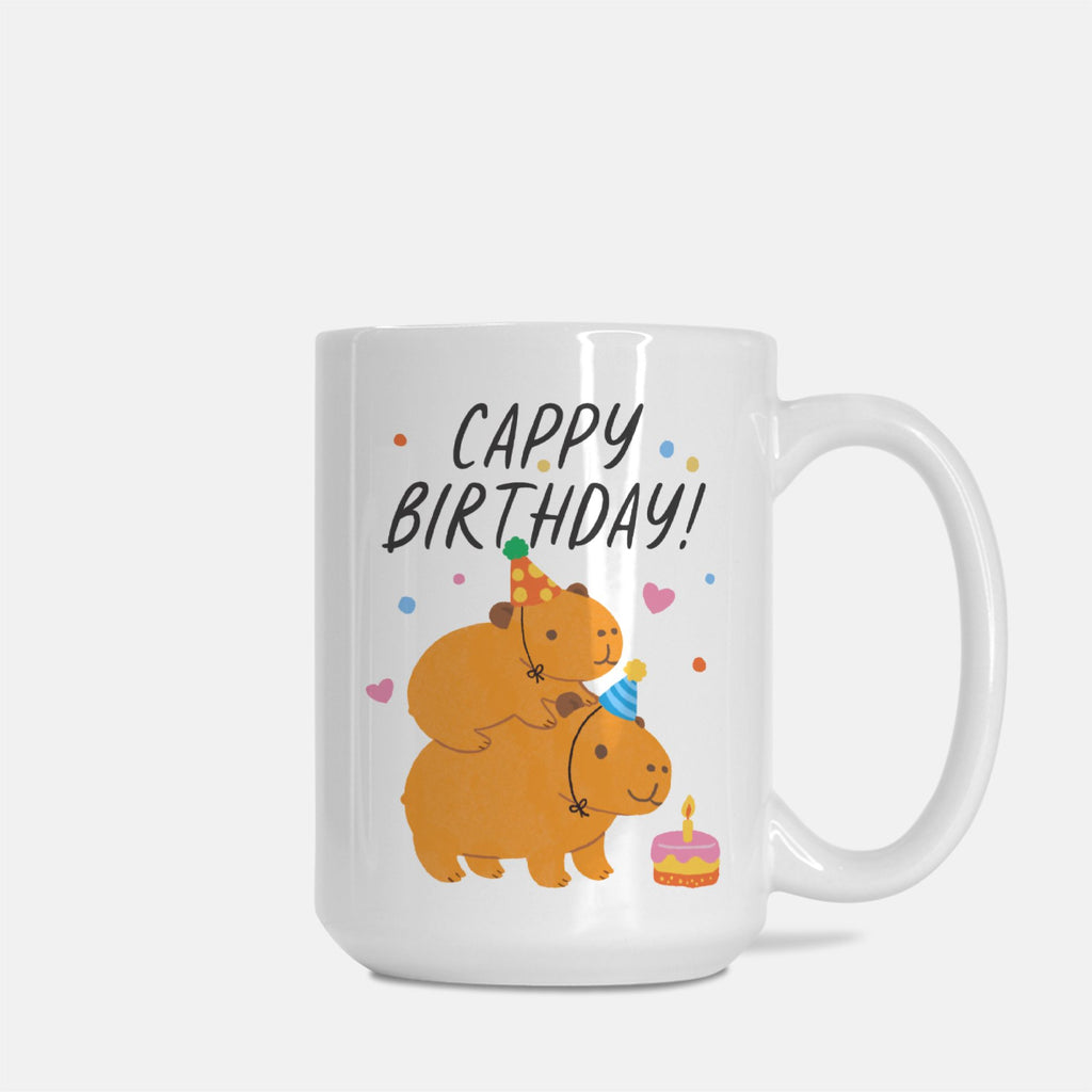White mug with cartoon bears celebrating a birthday and 'Cappy Birthday!' text on a white background