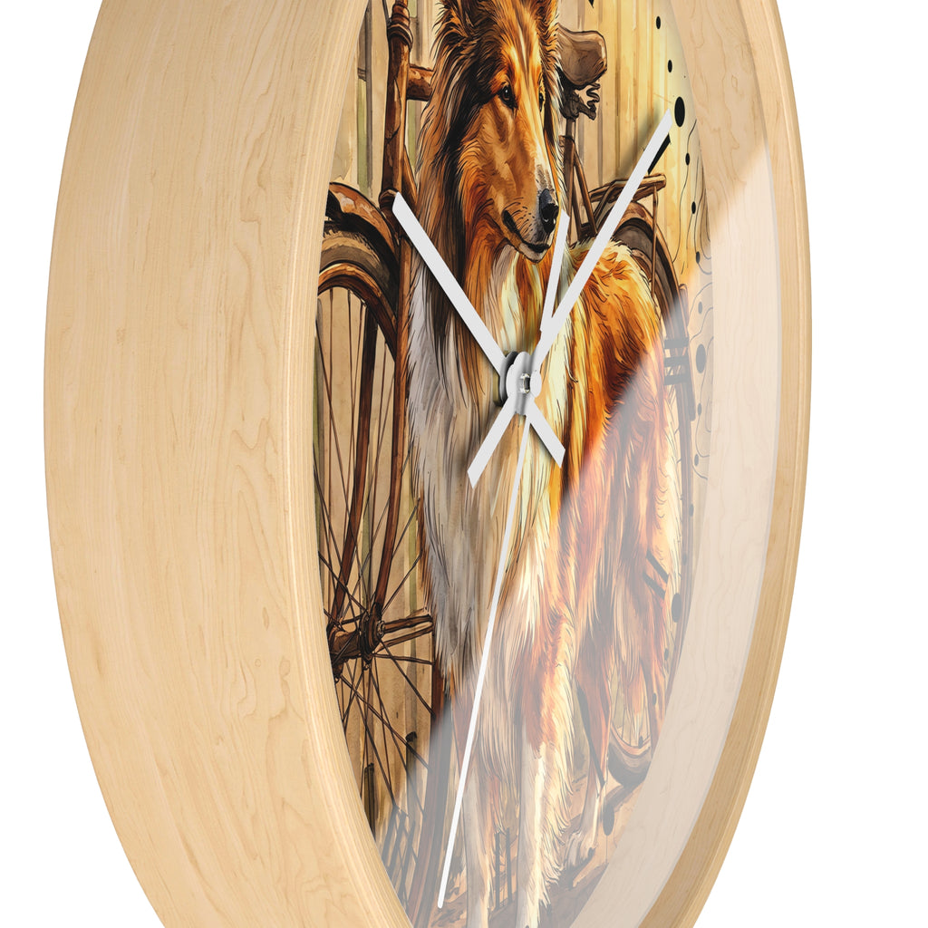 Round wall clock with a light natural wood frame and a printed artwork of a collie dog in front of a bicycle wheel, shown against a plain white background.