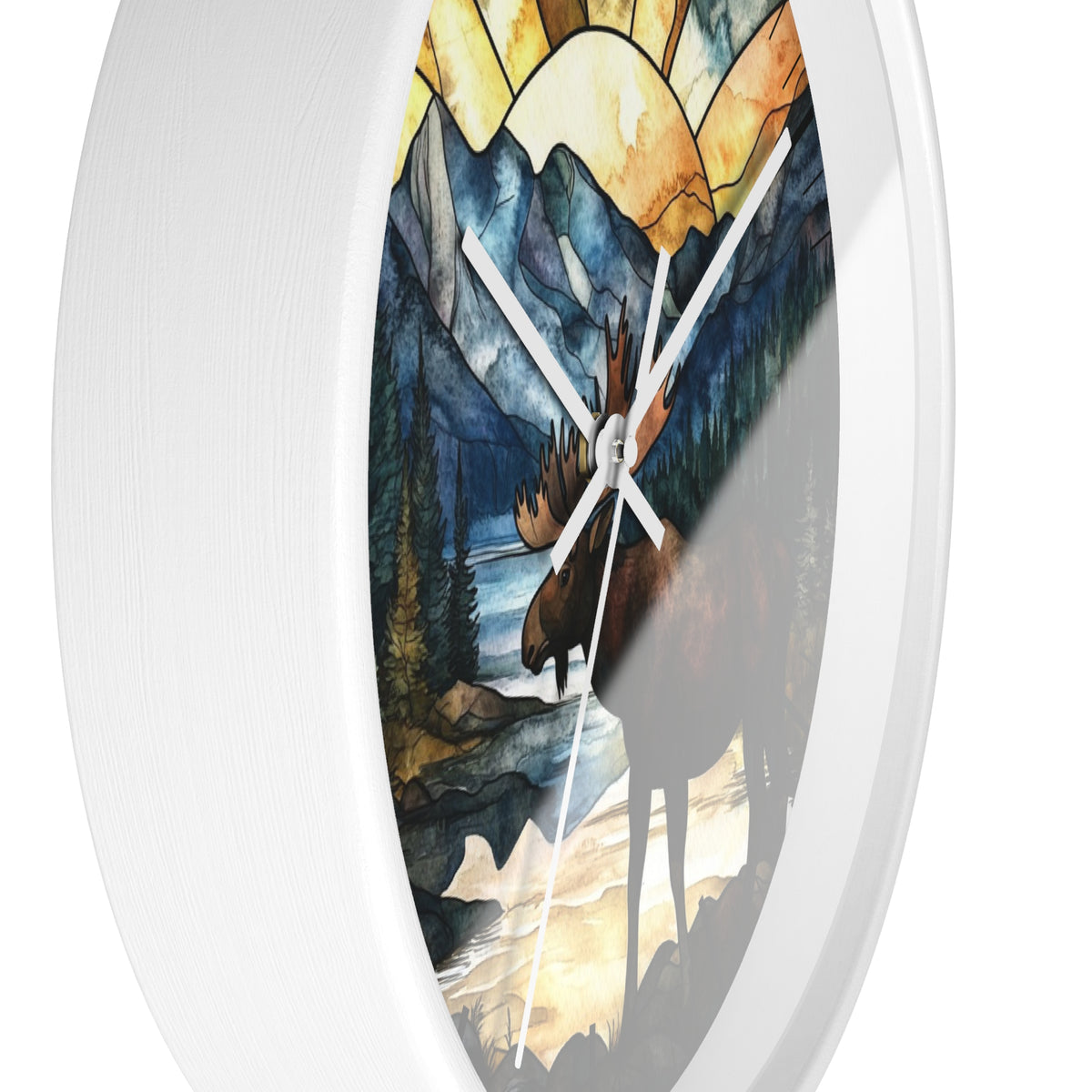 Round wall clock with a white frame and a stained-glass-style nature print featuring a moose, mountains, trees, and a river.