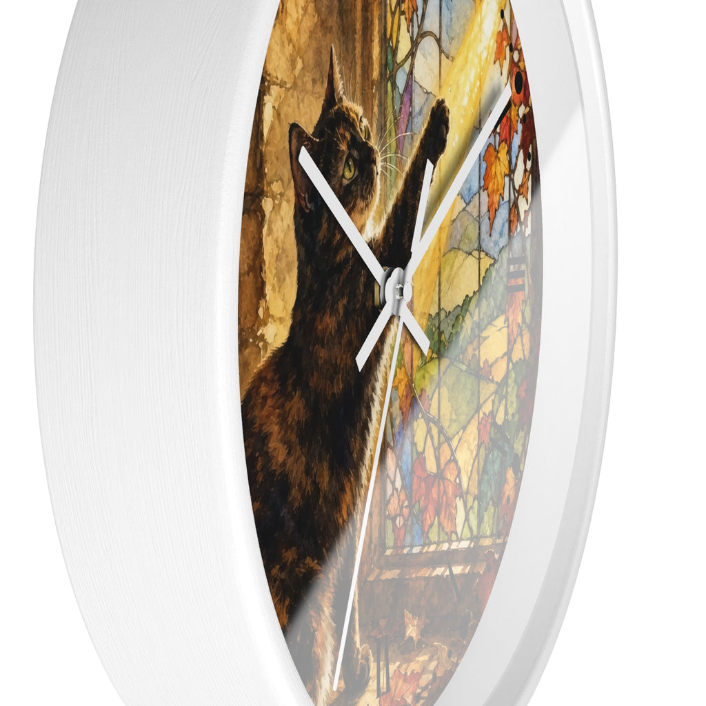 Round wall clock with a white frame and a printed illustration of a black cat reaching upward against a stained-glass-style multicolor background.