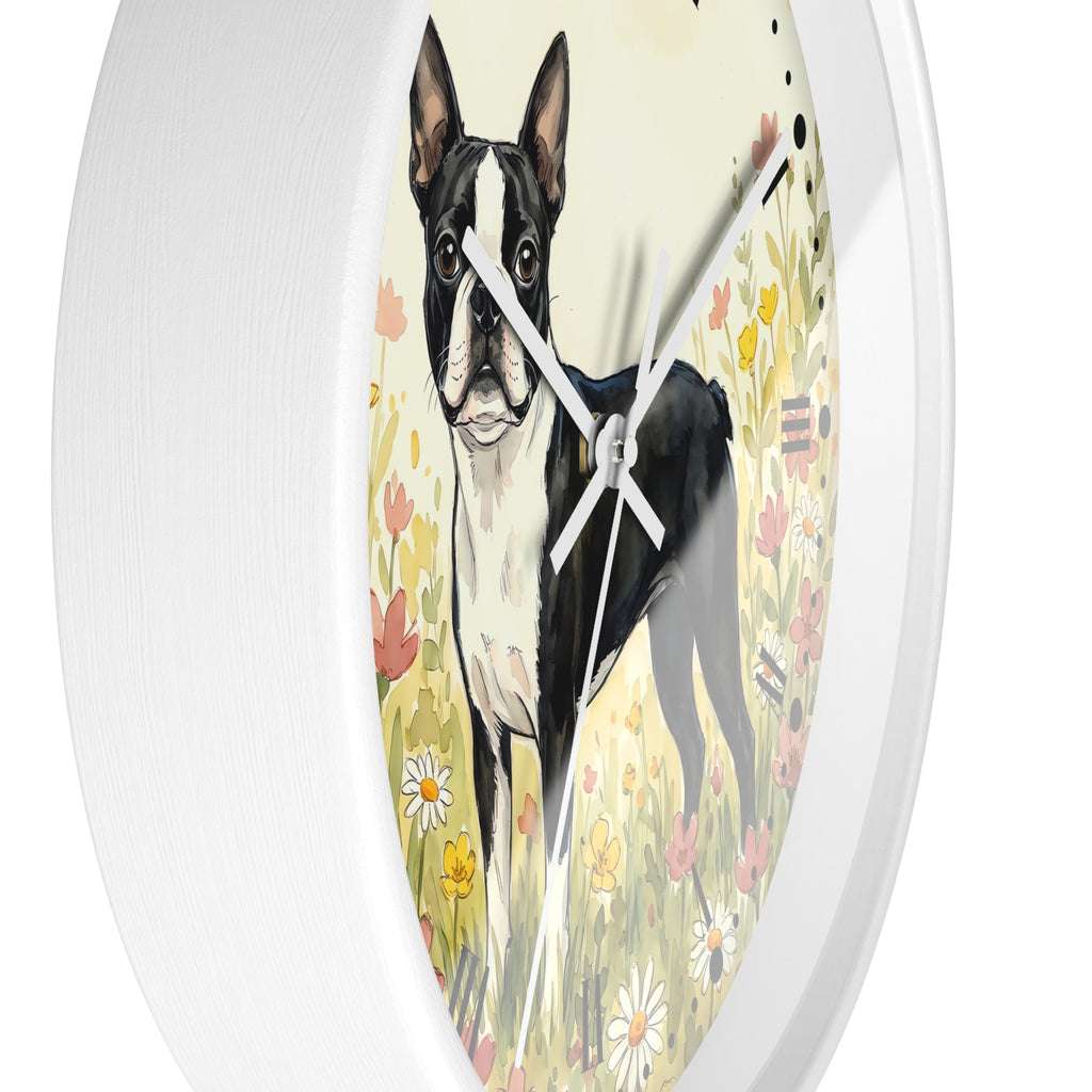 Round wall clock with a white outer rim and a printed illustration of a black-and-white Boston Terrier standing in a field of flowers, shown against a plain white background.