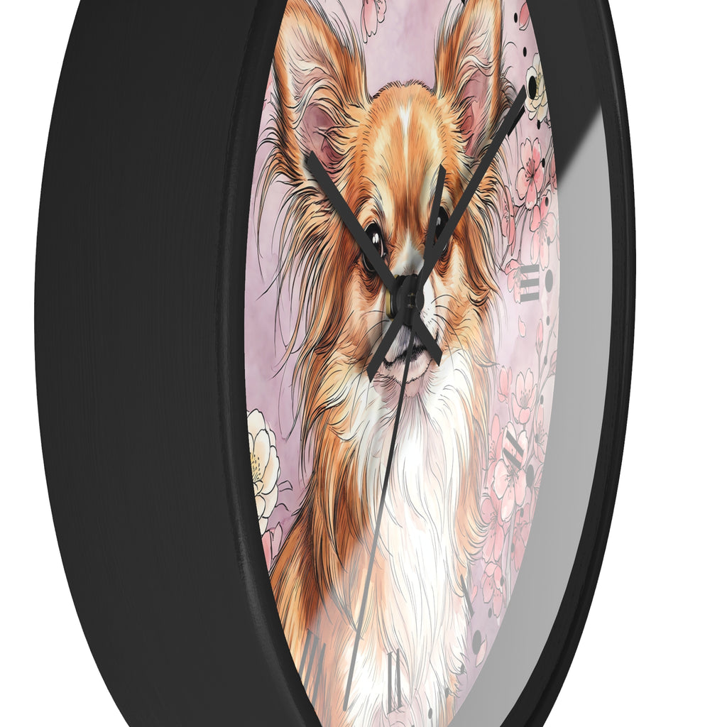 A round wall clock with a black frame and a printed illustration of a long-haired dog on a pink floral background.