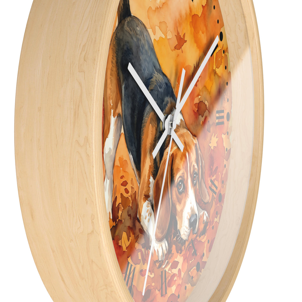 Round wall clock with a light natural wood frame and a printed artwork of a beagle dog among orange autumn leaves, shown against a white background.