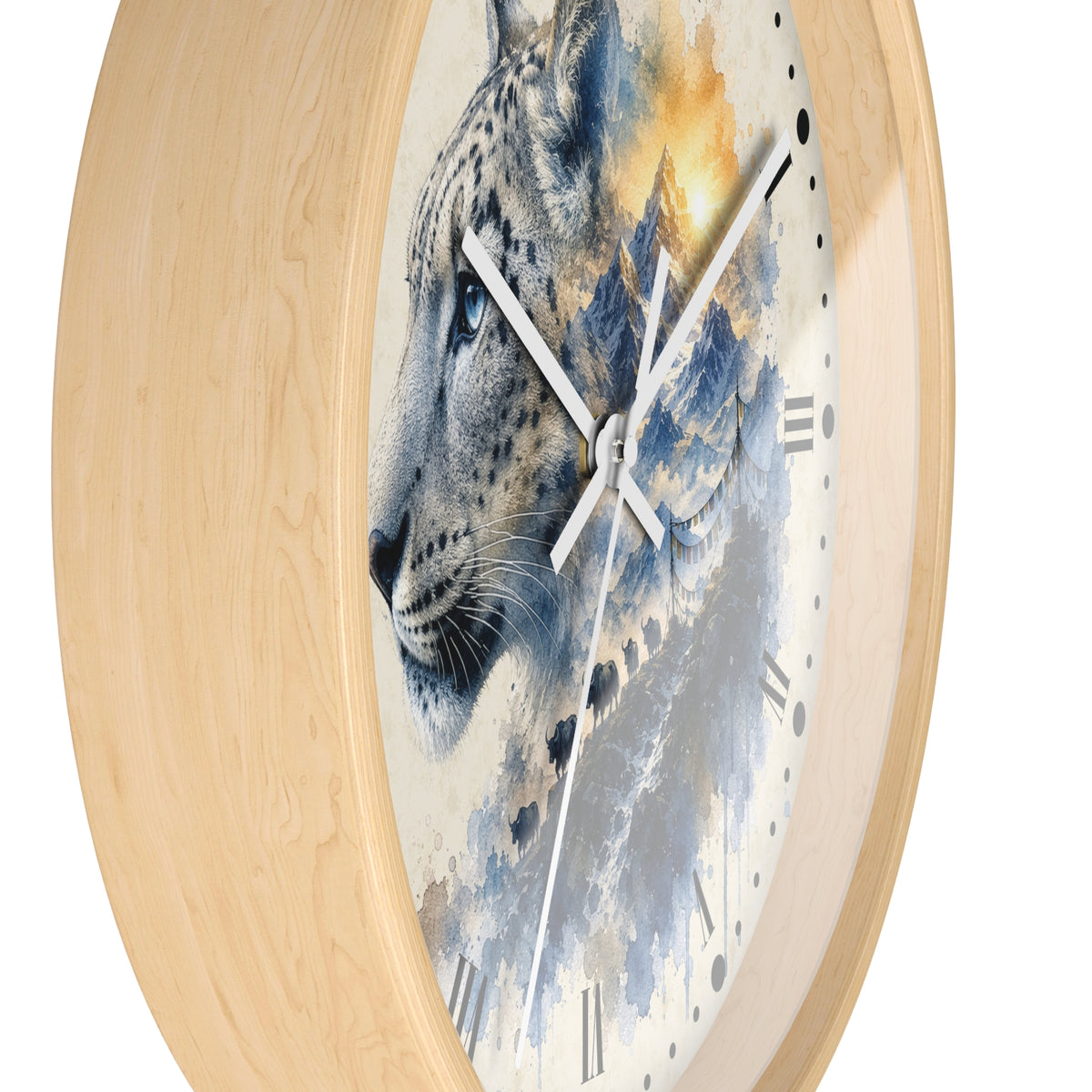Round wall clock with a light natural wood frame and a printed face featuring a stylized snow leopard in blue, gray, and white tones with a warm golden mountain peak.