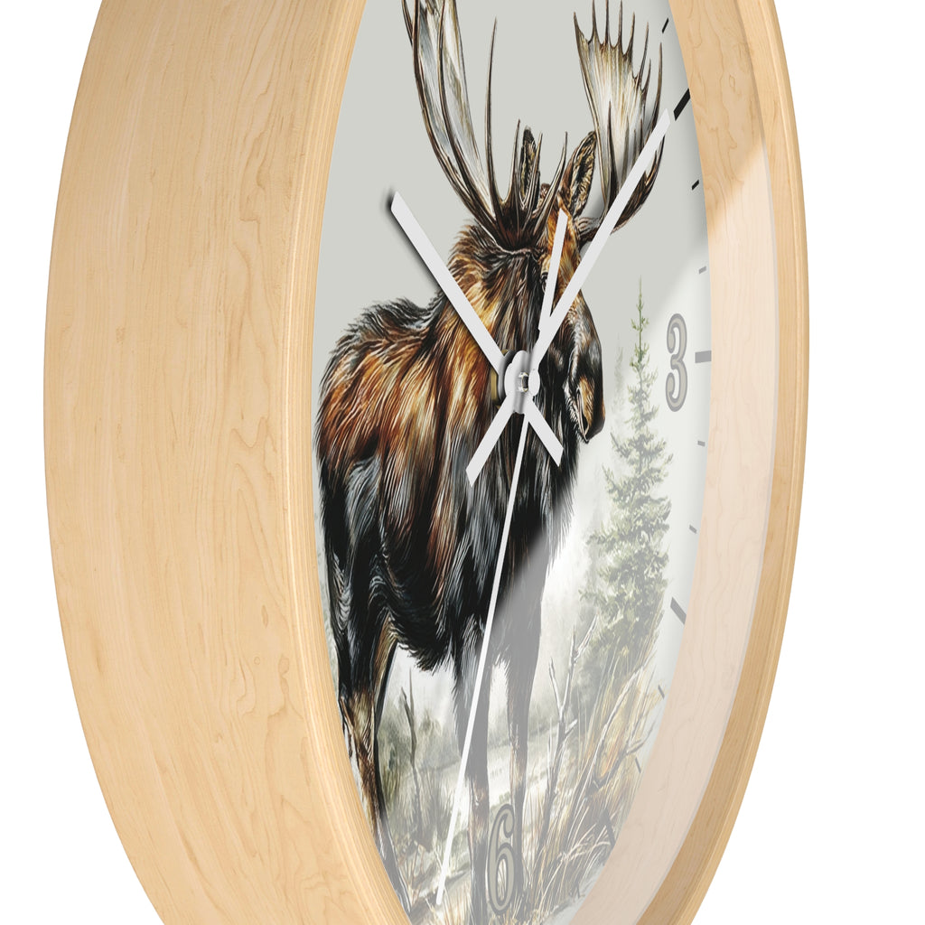 Round wall clock with a light natural wood frame and a printed moose illustration on the face, shown against a plain white background.