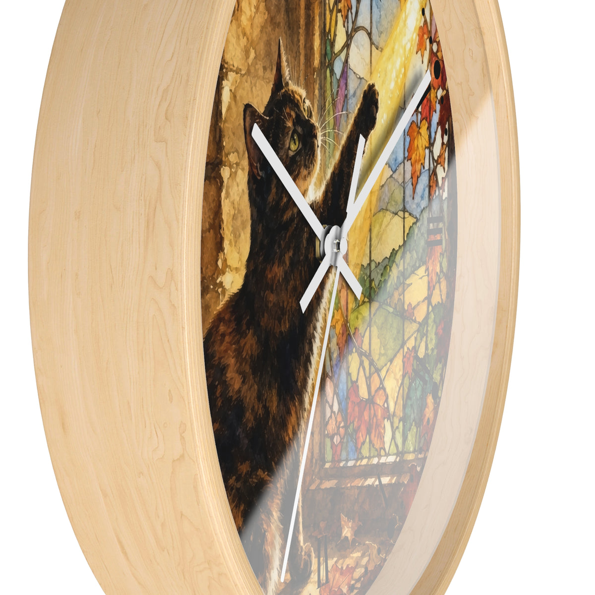 Round wall clock with a light natural wood frame and a printed artwork insert featuring a dark cat in front of a stained-glass-style window scene.