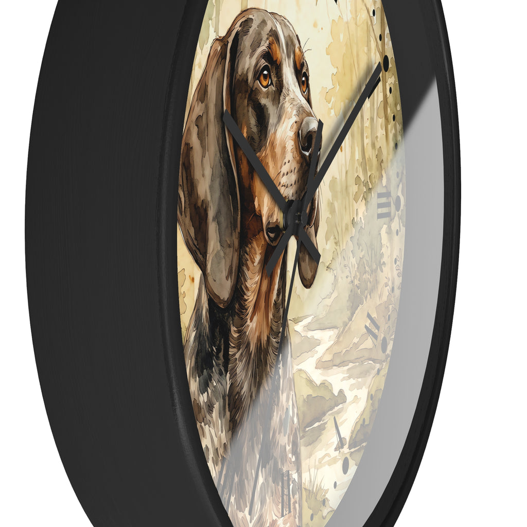 A round wall clock with a black frame and a printed illustration of a spotted hunting dog on the face, shown against a plain white background.