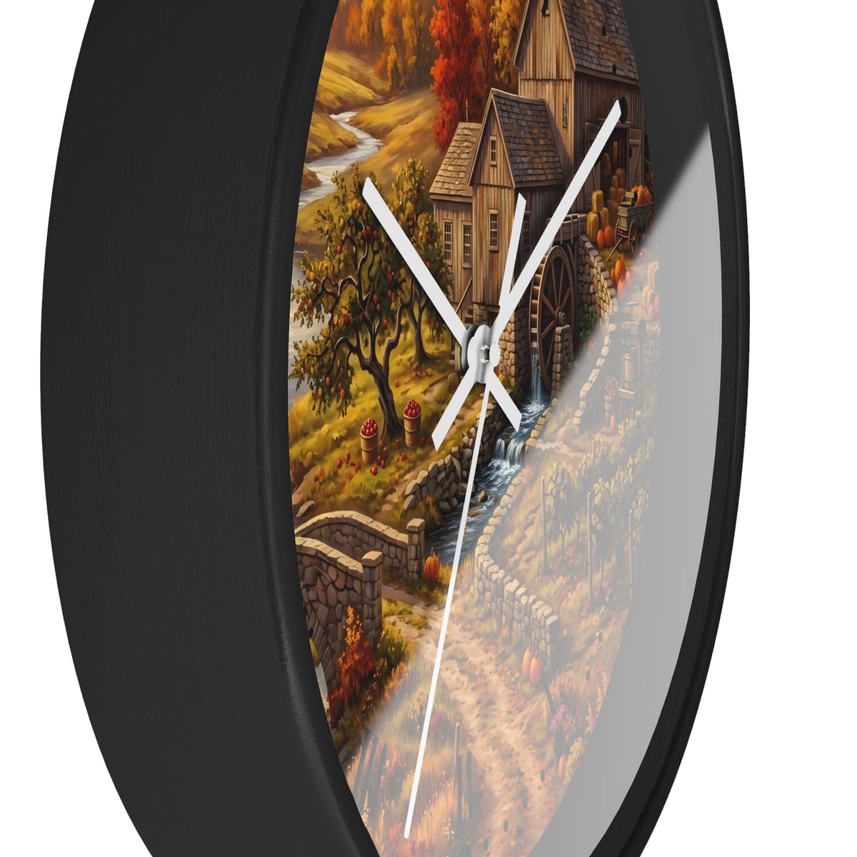 Round wall clock with a black frame and a scenic autumn landscape print featuring a watermill, trees, and a winding river, with white clock hands.