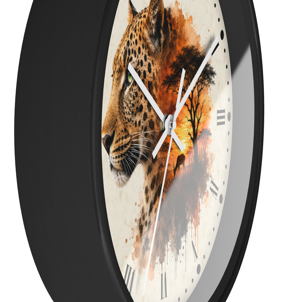 A close-up of a round wall clock with a black frame and a printed face featuring a leopard face blended with an orange sunset and tree silhouette, plus white Roman numerals.
