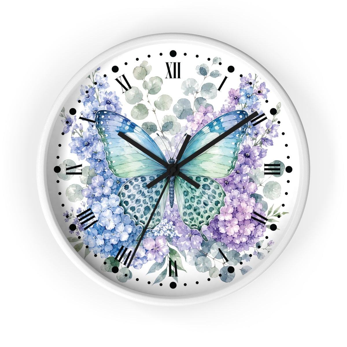 A round wall clock with a white frame and a watercolor-style floral and butterfly design. The clock face features blue and purple flowers, green leaves, a blue-green butterfly at the center, black Roman numerals, and black clock hands on a white background.
