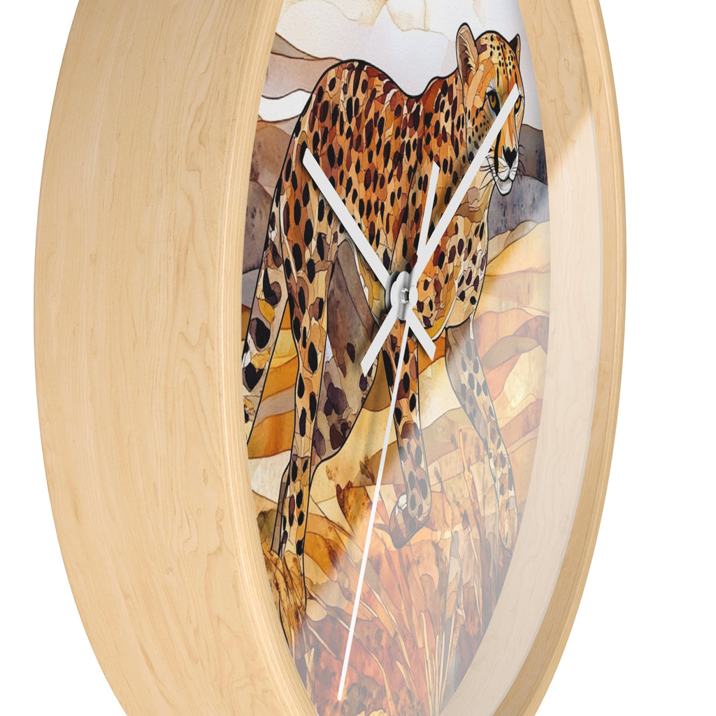 Oval wall clock with a light natural wood frame and a printed artwork of a spotted big cat walking over rocks, with white clock hands on a white background.