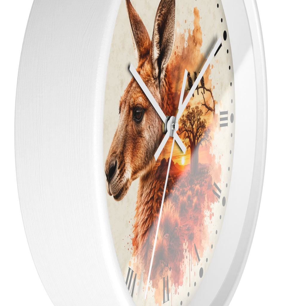 A round wall clock with a white frame and a printed face featuring a kangaroo portrait over an abstract sunset landscape in warm orange, red, and beige tones.