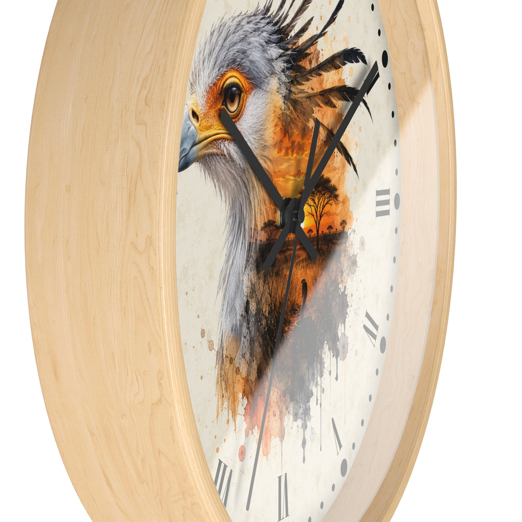 Round wall clock with a light natural wood frame and a printed bird face design on the dial. The clock face is off-white with black Roman numerals and black hands, and the bird artwork shows gray, orange, brown, and black tones.