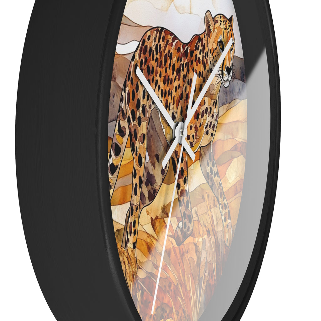 Round wall clock with a black frame and a printed illustration of a cheeetah in warm earthy tones on the face, shown against a white background.