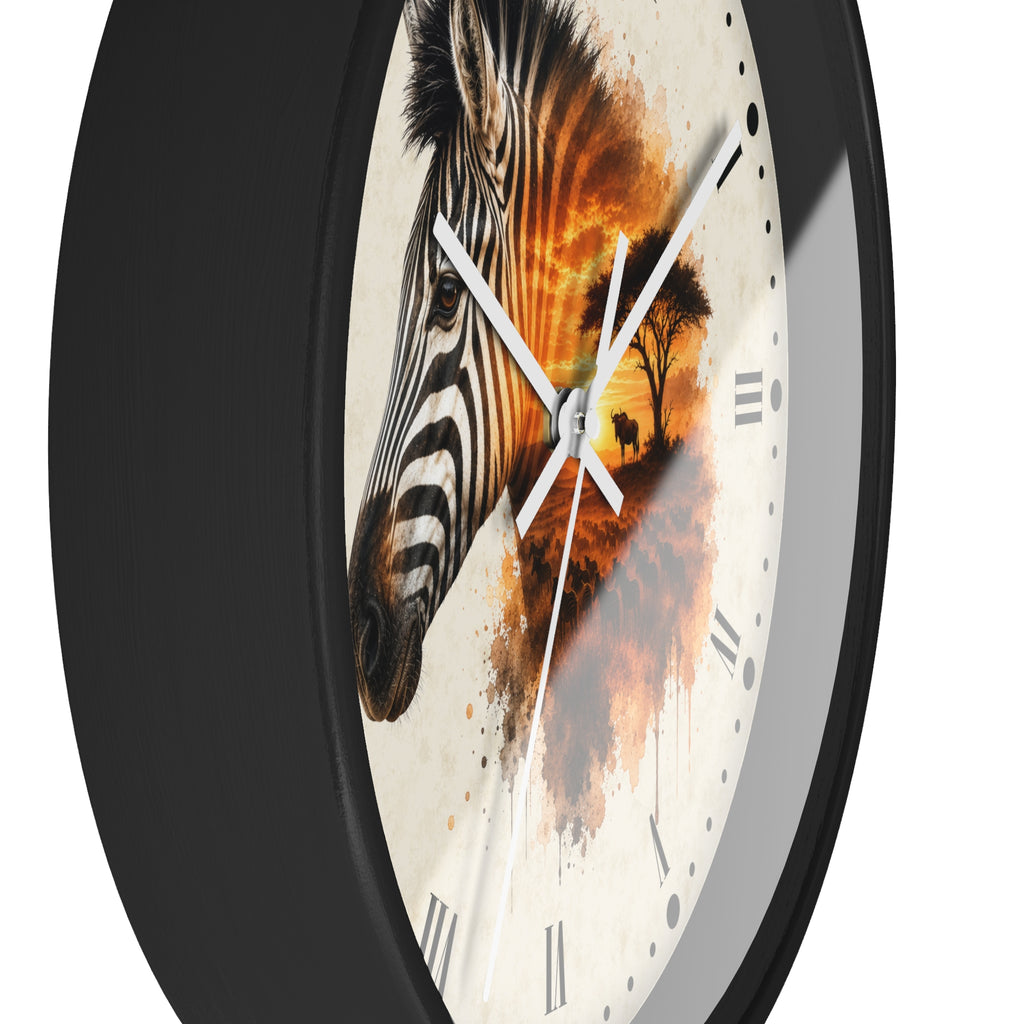 A round wall clock with a black frame and a split design: one half shows a zebra head in black and white, and the other half shows an orange sunset scene with trees. The clock face is off-white with Roman numerals and white hands.