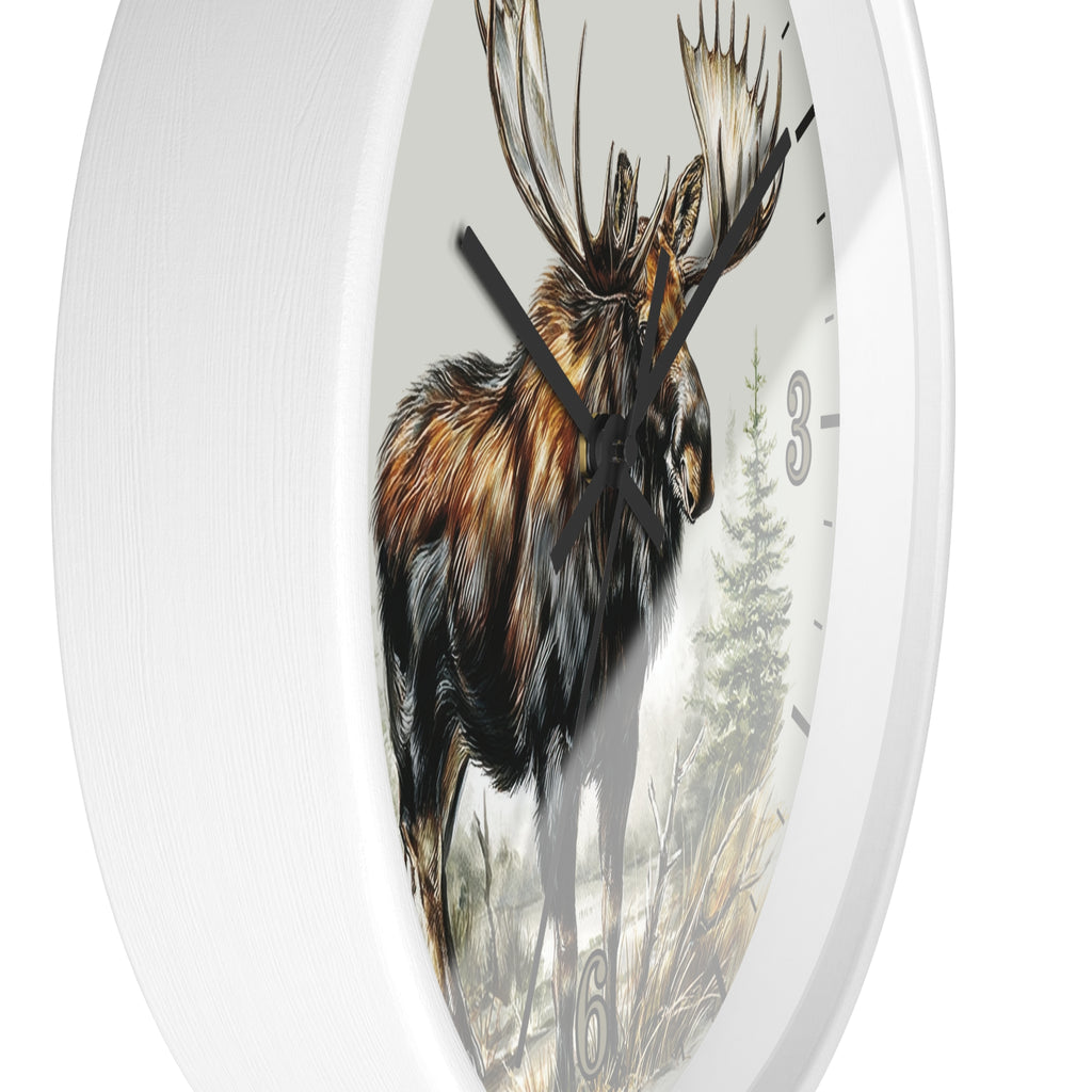 A round wall clock with a white frame and a printed moose illustration on the face, shown against a plain white background.