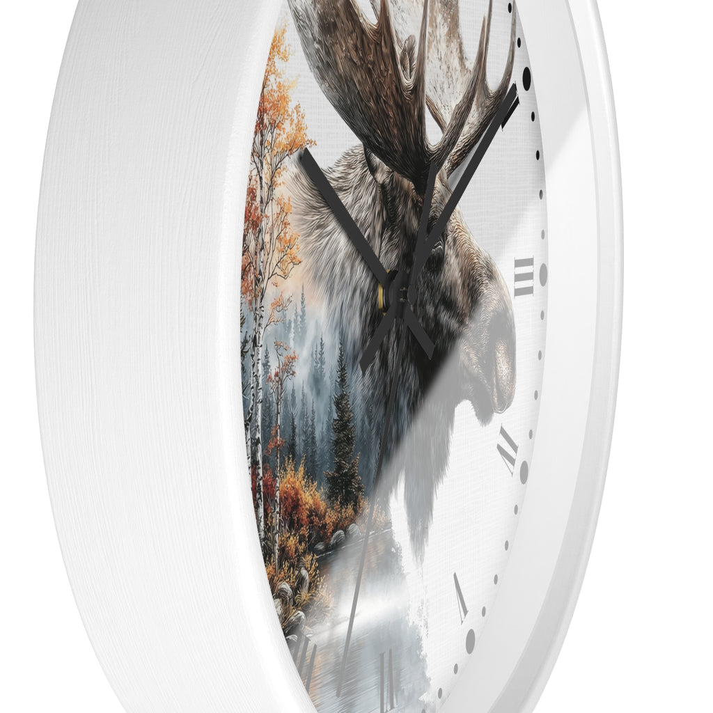 A white round wall clock with a printed design of a moose head over an autumn forest scene, shown against a plain white background.