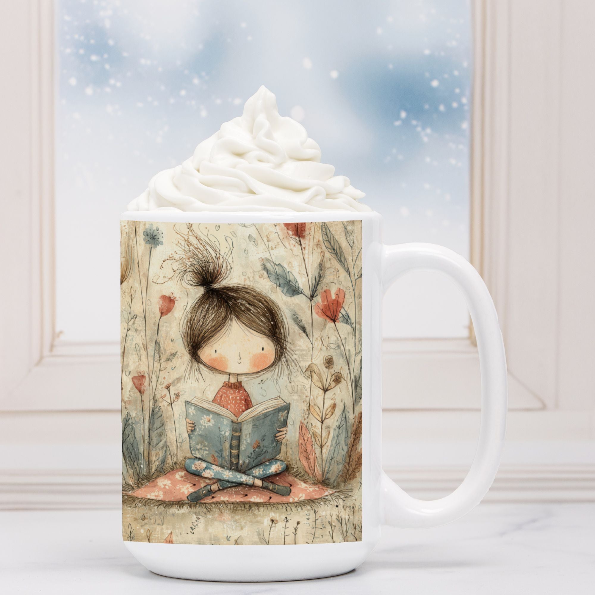 Mug with a decorative design of a girl reading a book, topped with whipped cream.